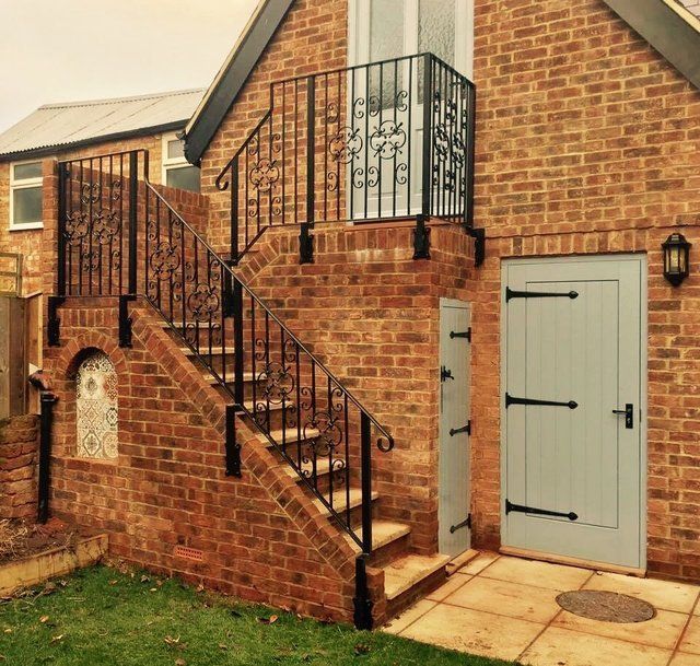 Ornate stair and rail access to garden studio