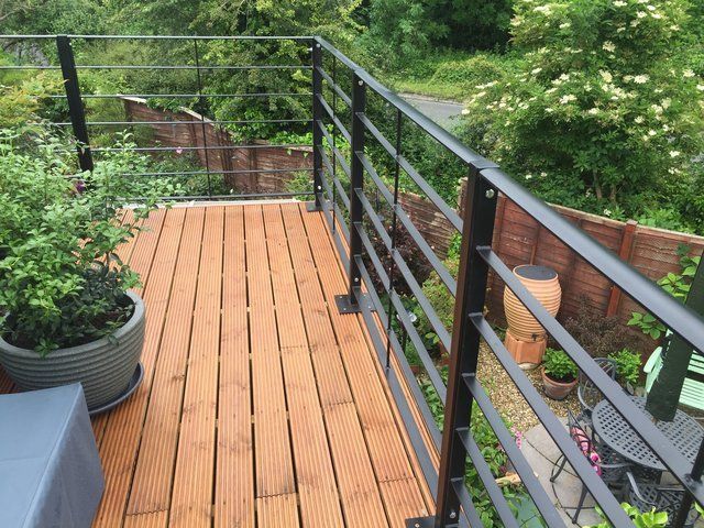 Rails to enhance and utilise flat roof area