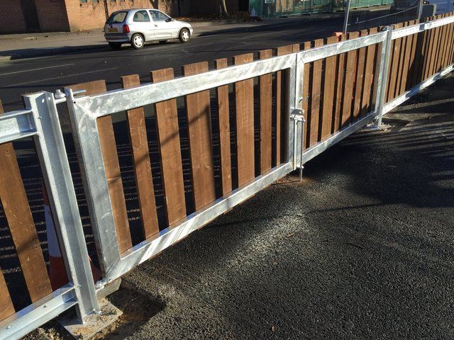 Timber and galvanised steel gates and rails at Westgate Centre Oxford.