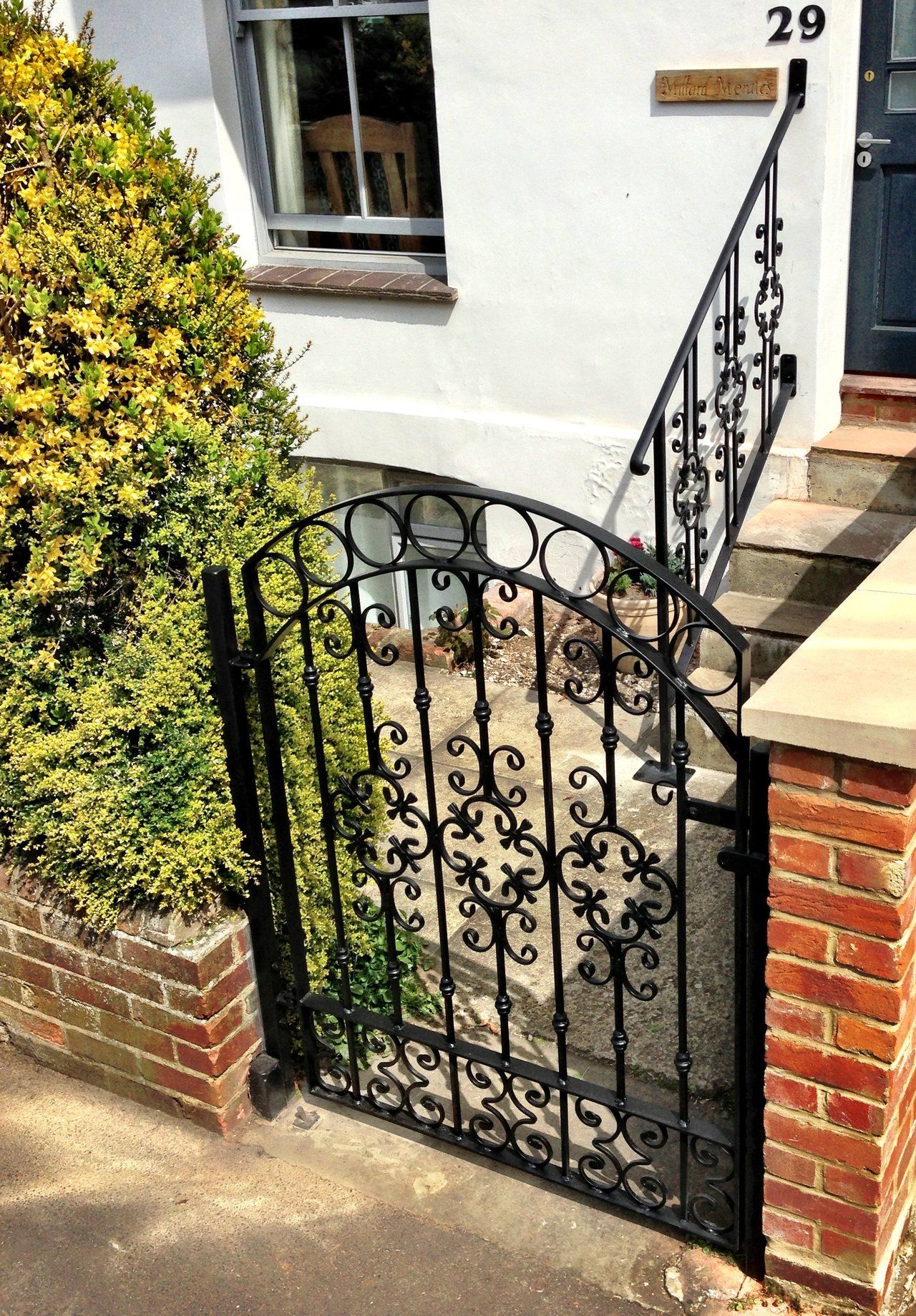 Matching ornate gate and rail