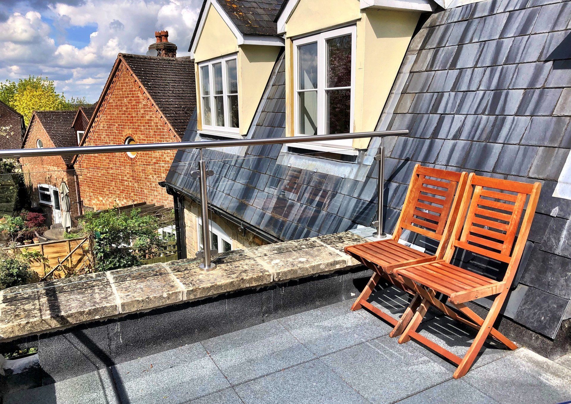 Rails to a flat roof.