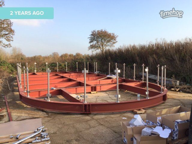 Exhibition stand showing steel posts for glass rails