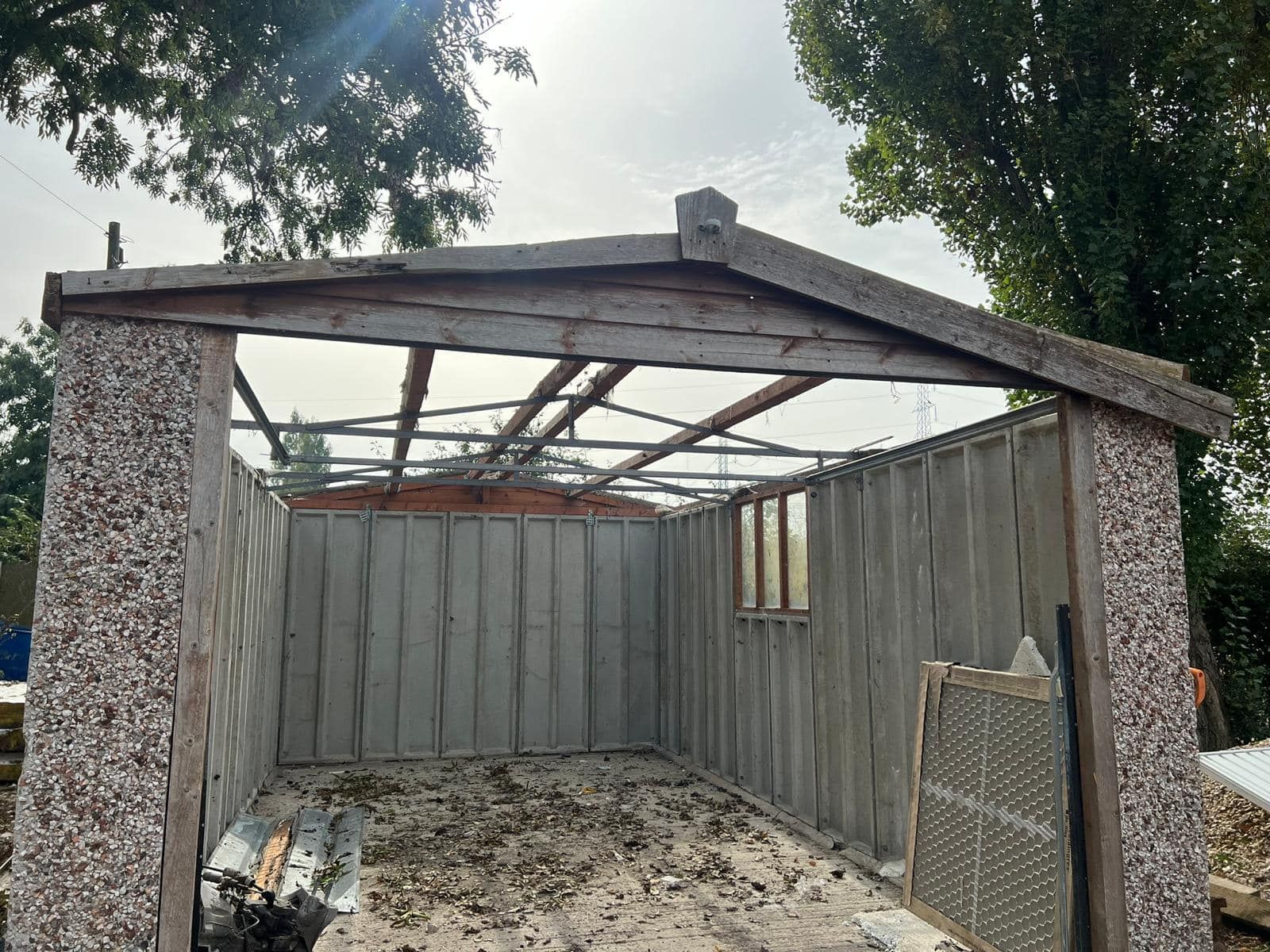 During- Asbestos Garage removal  roof