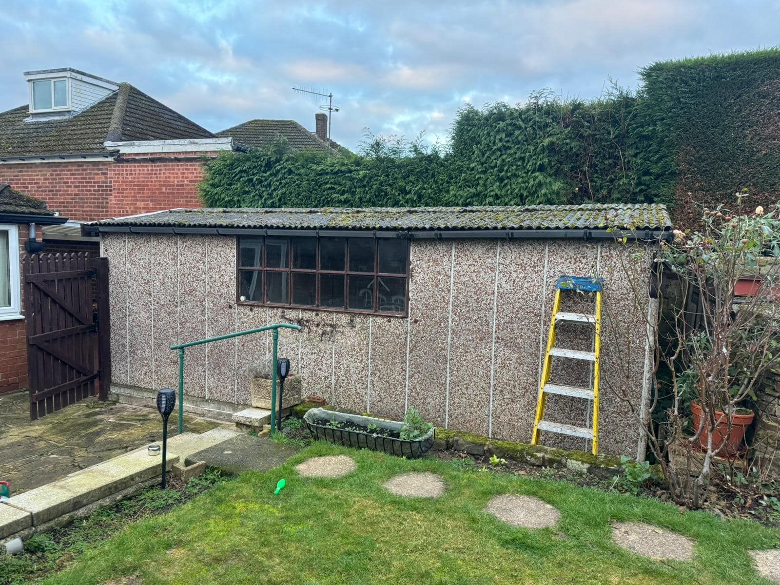 White old asbestos garage