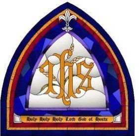 A stained glass window with the word ihs on it