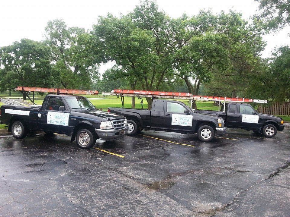 Parked Pick Up Trucks — Overland Park, KS — Clean Gutter Services