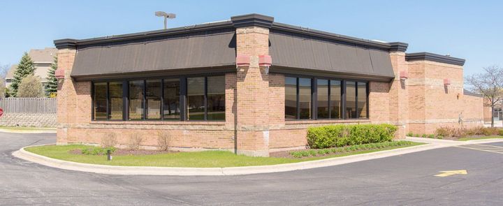 A large brick building with a lot of windows