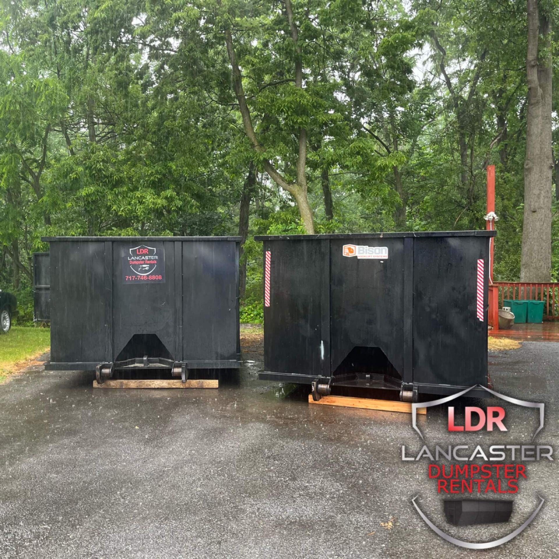 Dumpster Rental in Wrightsville Pa in front of a local business using it to clean out some junk.