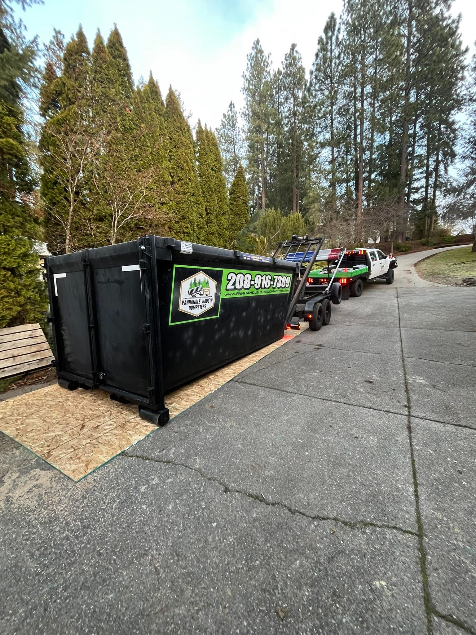 Panhandle Haul'in Dumpsters delivering roll-off in North Idaho