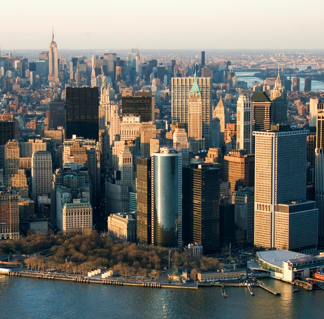 Manhattan skyline, New York City, with skyscrapers and waterfront view.