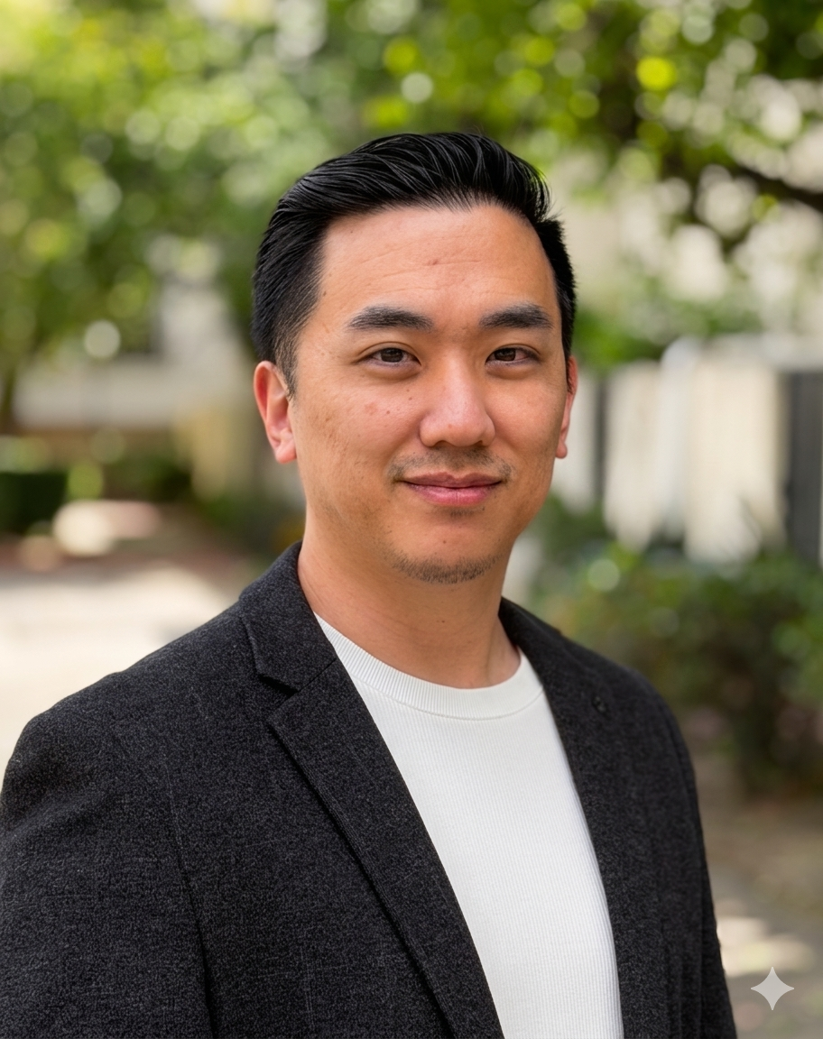 A woman with curly hair is wearing a purple dress and a black jacket.