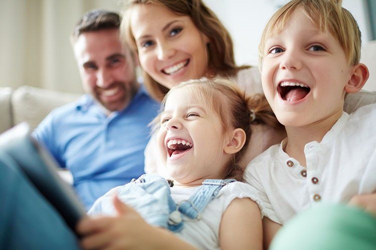 Smiling family - Dental Care in Sumter, SC