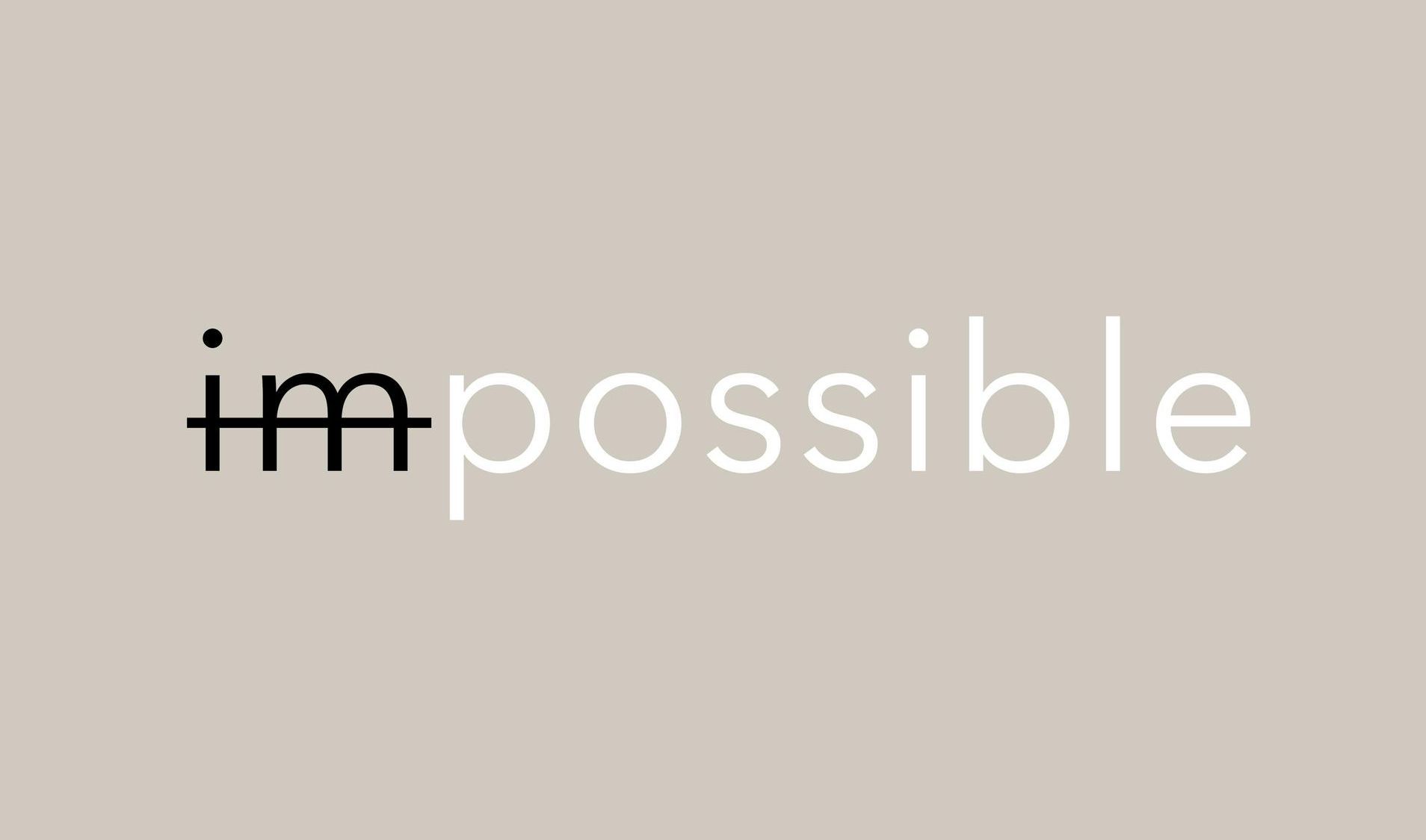 The word impossible is written in black and white on a beige background.
