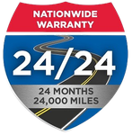 A blue and red sign that says nationwide warranty