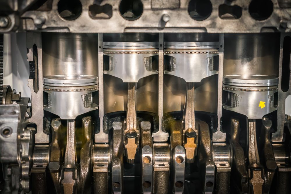 Cross-section of an Engine With Four Pistons Visible — Cairns Electrical Rewinds & Repairs In Townsville, QLD
