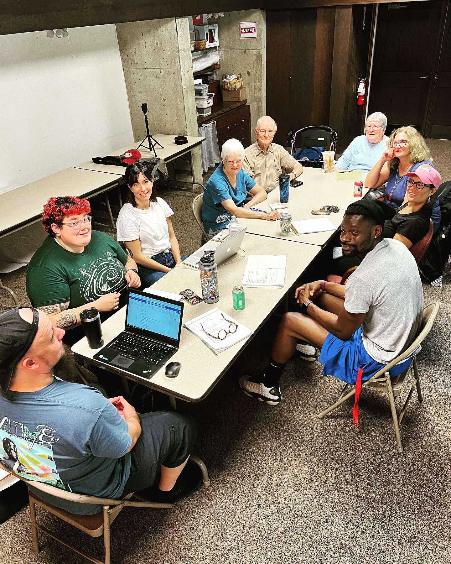Group of People Seated Around a Table — Amherst, MA — Immanuel Lutheran Church
