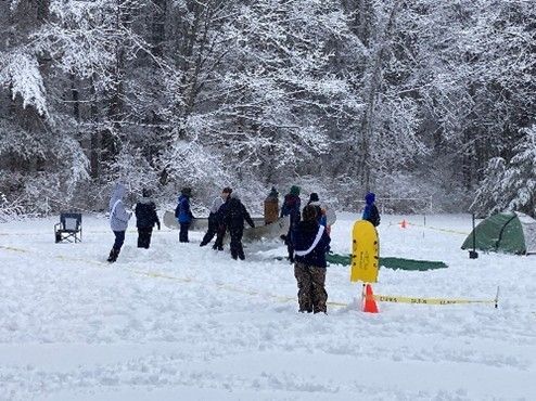 People in A Snowy Field — Amherst, MA — Immanuel Lutheran Church