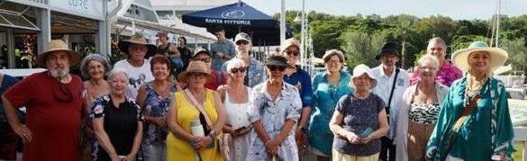 A group of people are posing for a picture together.