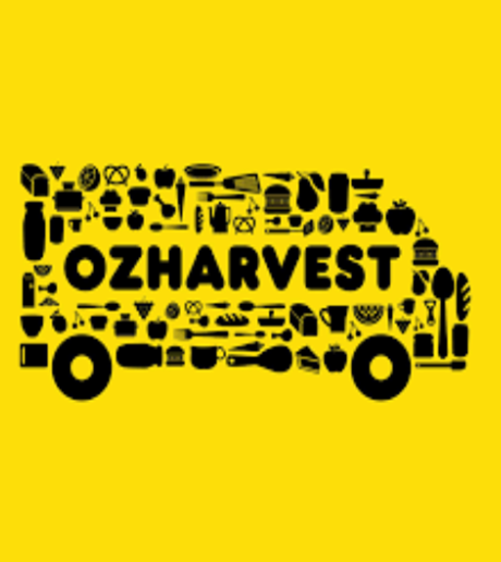 A yellow sign that says ozharvest on it