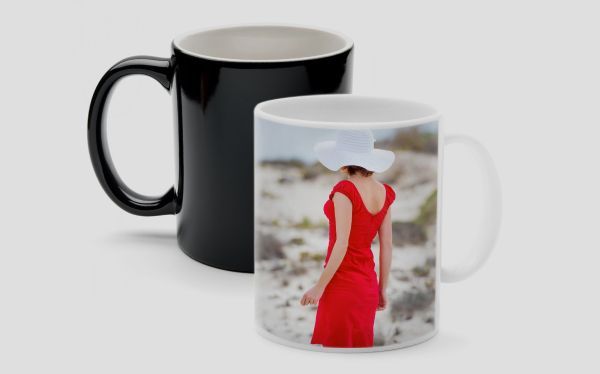 Black mug and white mug with a red dress photo print
