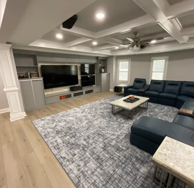 A living room filled with furniture and a flat screen tv