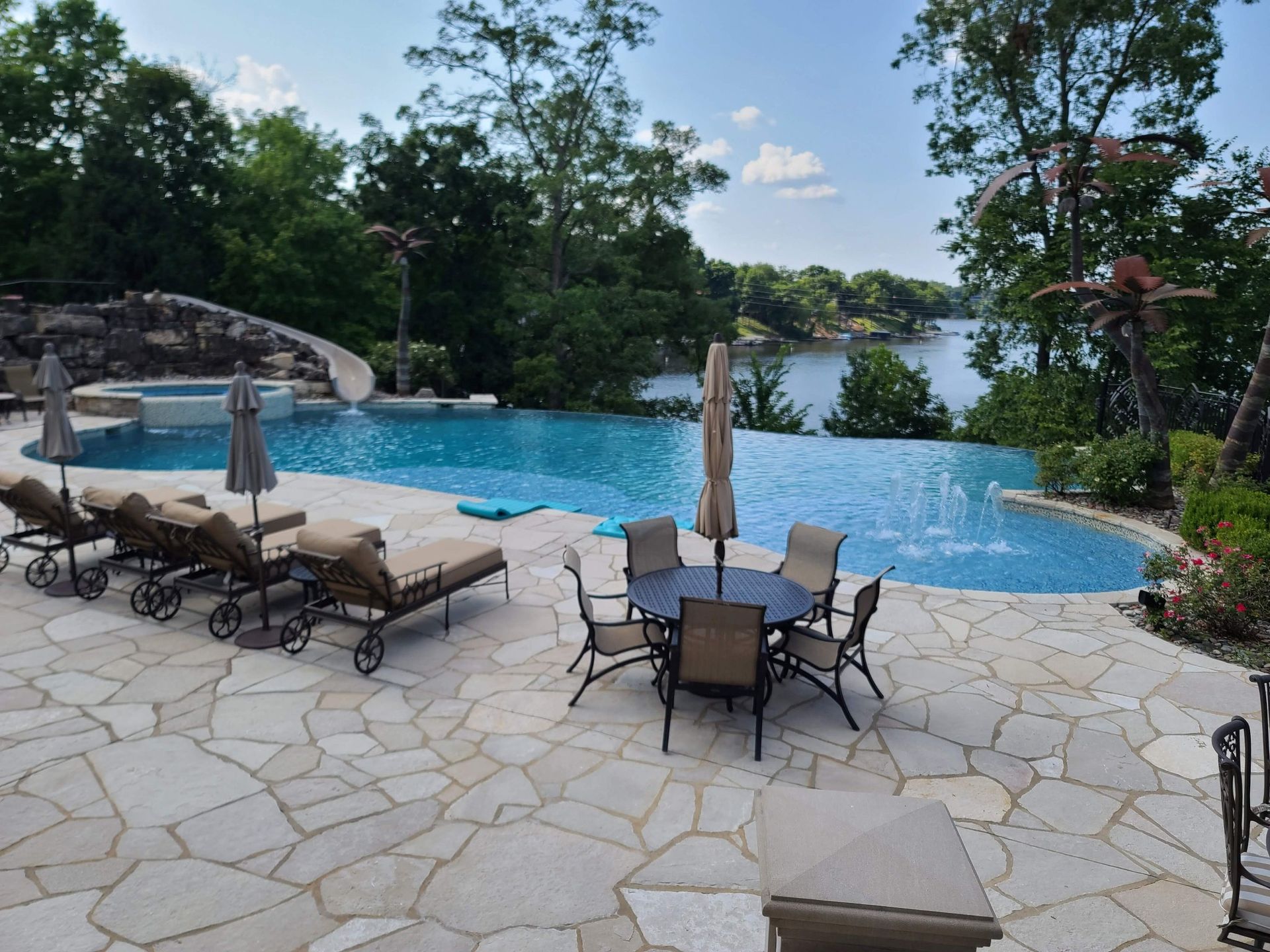 A pool overlooking a lake