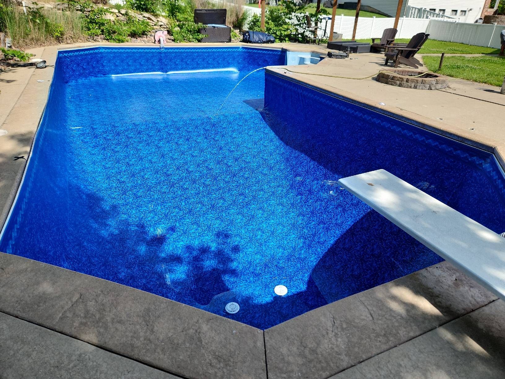 Empty Pool with Blue Wave Pattern Liner