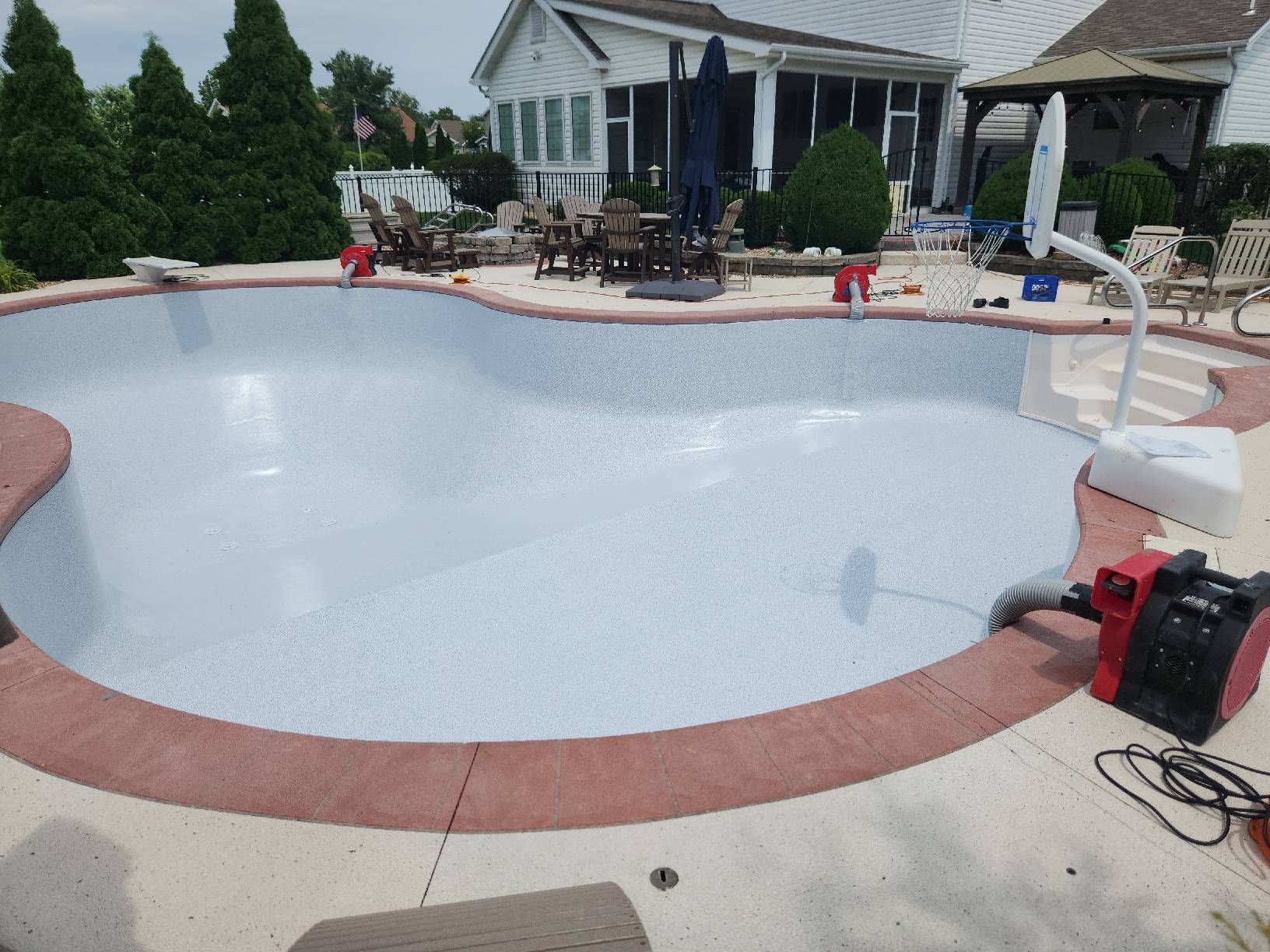 Empty Pool with Pale Blue Liner