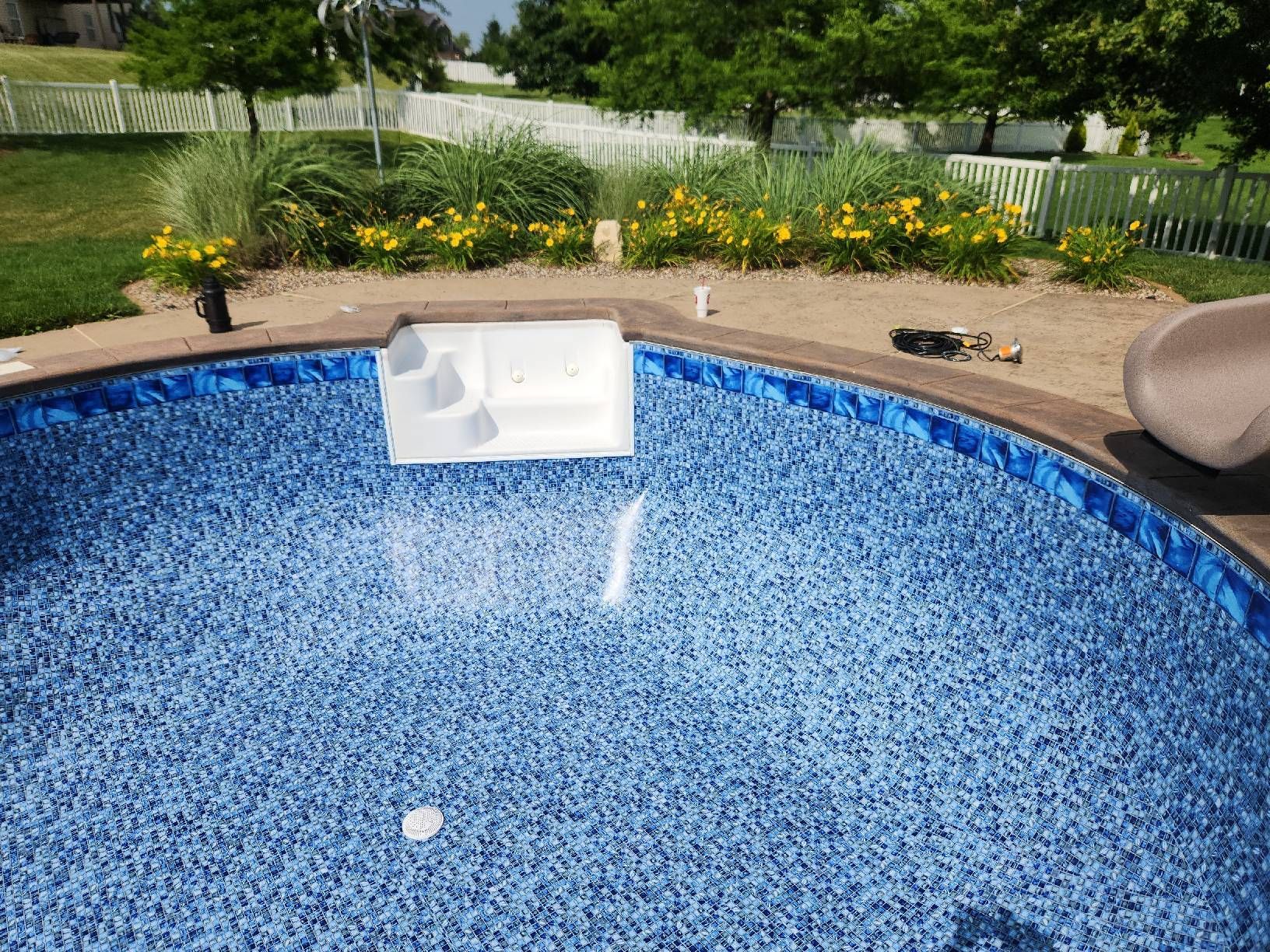 Empty Pool with Blue Tile Liner
