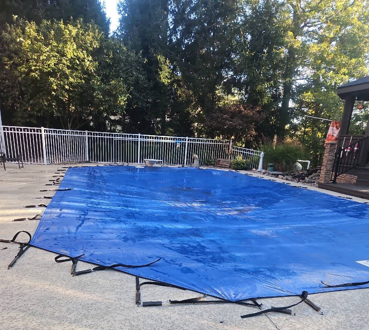 pool with blue solid cover