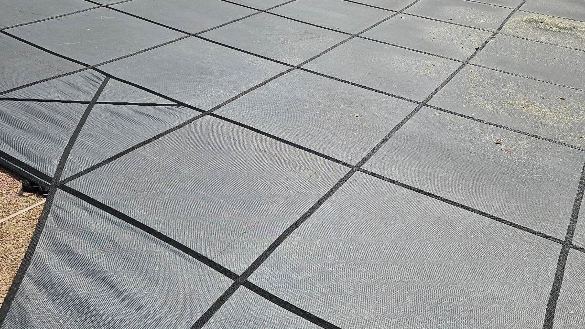 Grey mesh pool cover