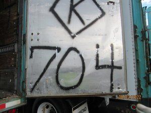 A truck with the number 704 written on it