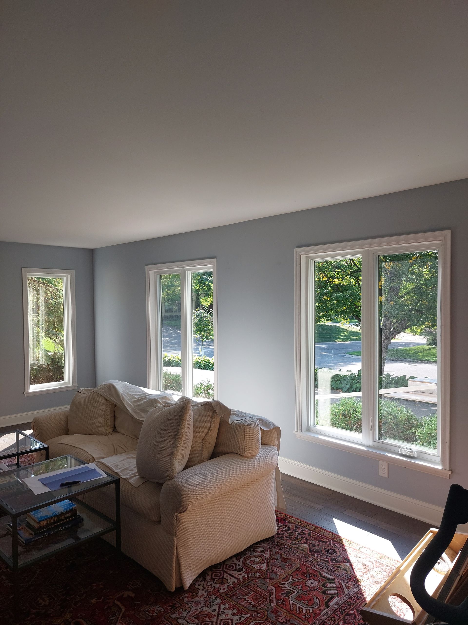 a living room with a couch a chair and a coffee table