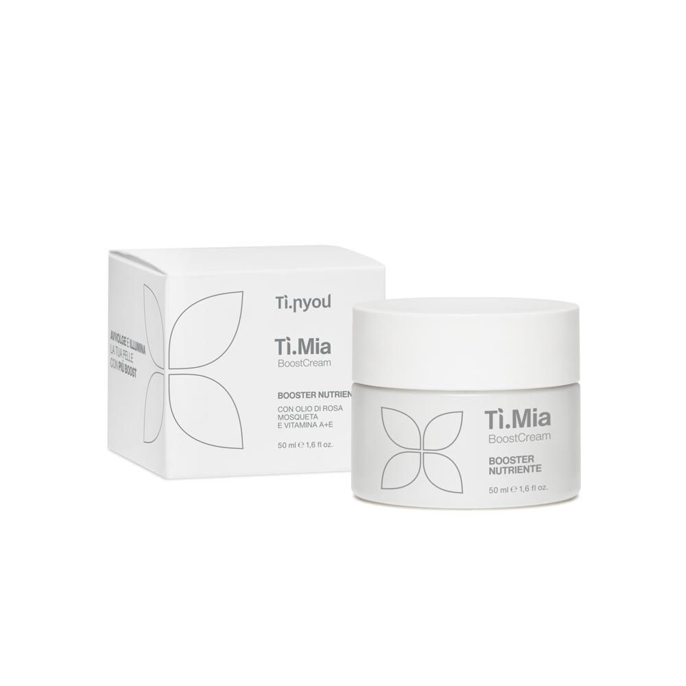 Un barattolo bianco di lozione accanto a una scatola bianca di Ti.Mia Boost Crema Nutriente