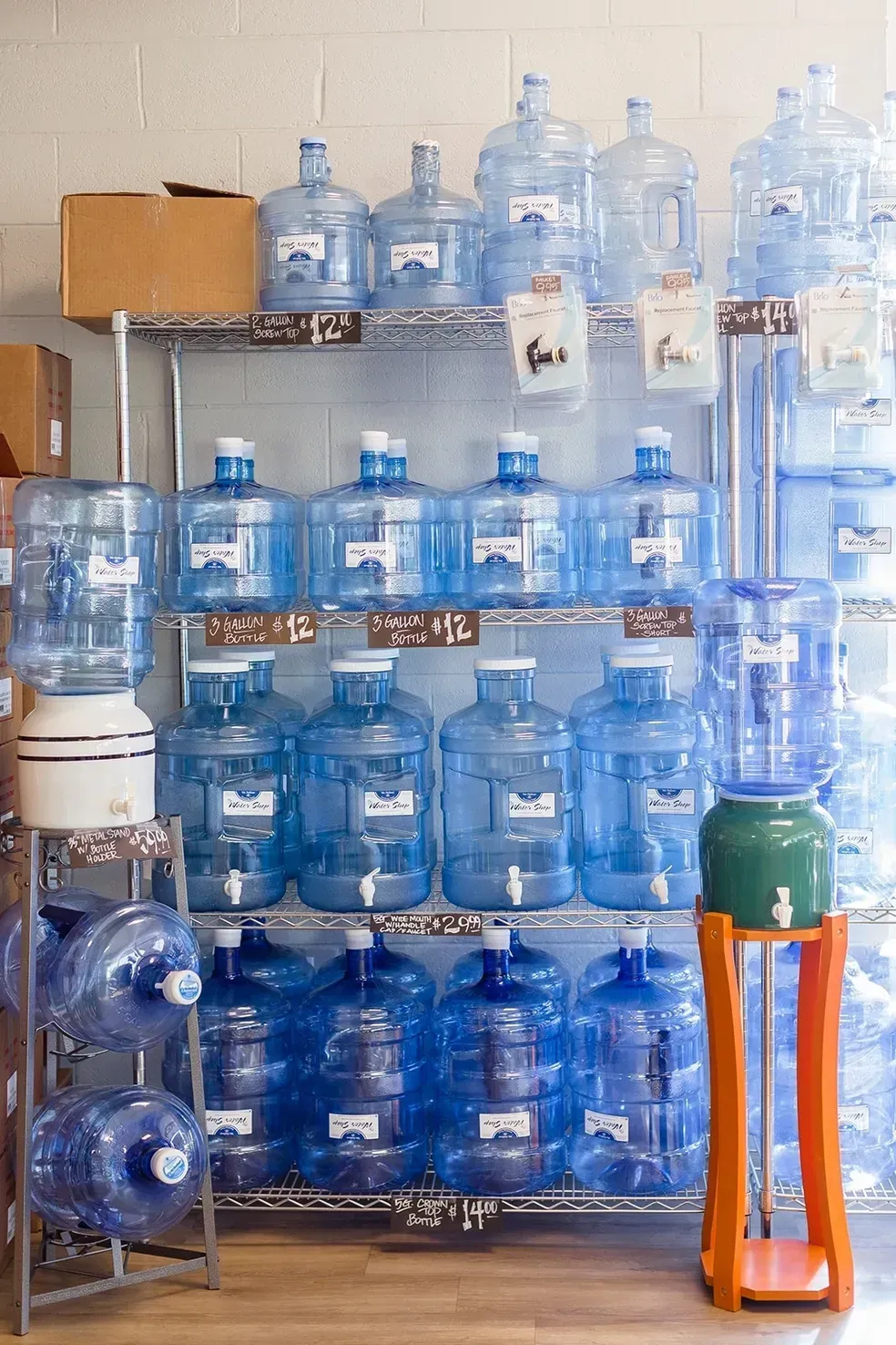 A room filled with lots of water bottles on shelves.