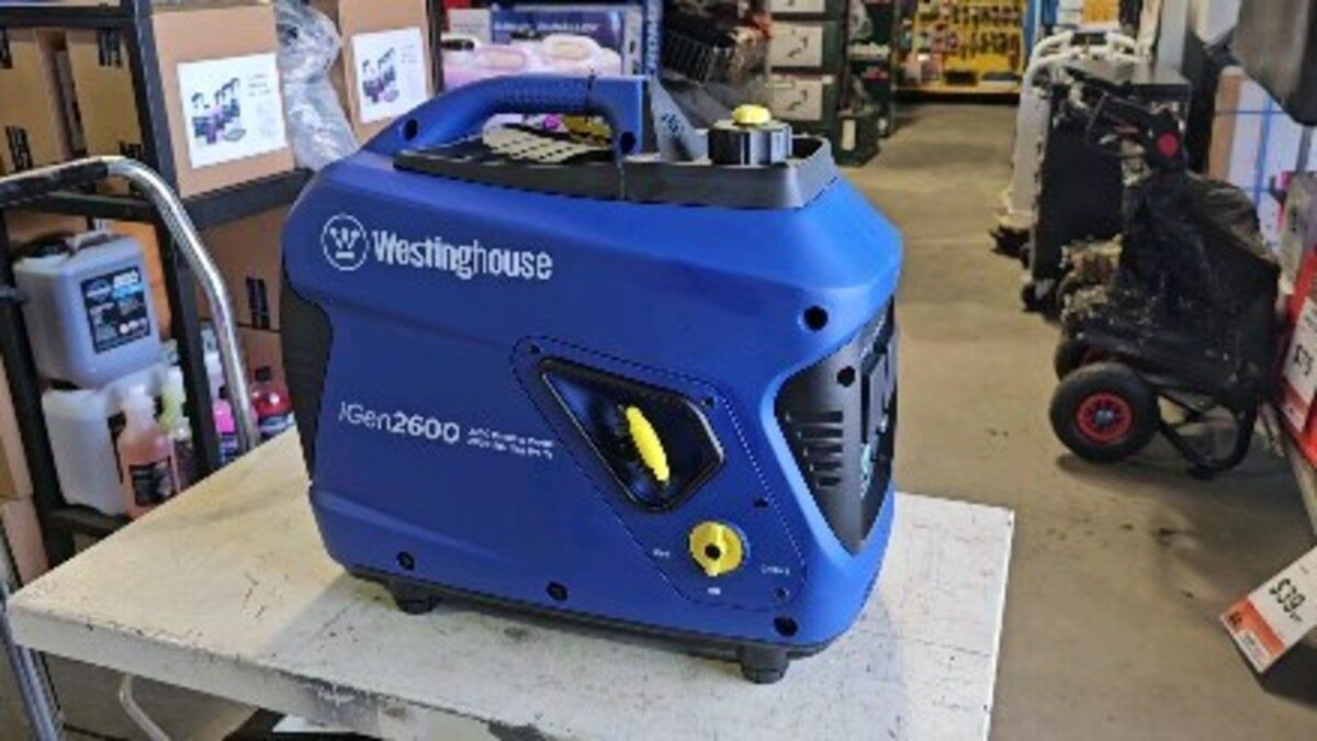 A Blue Generator Is Sitting On A Table In A Store — Summerland Tool Supplies In Casino, NSW