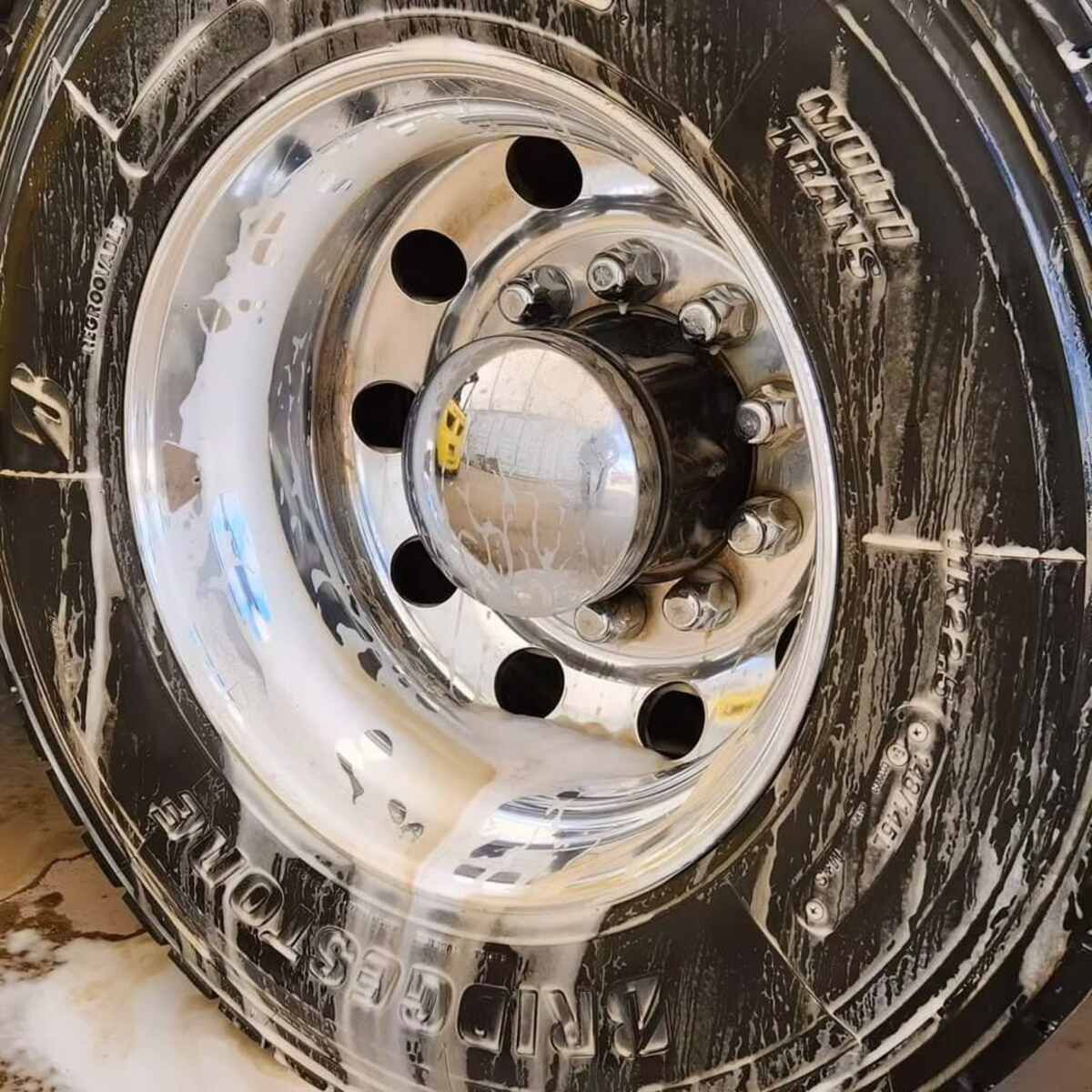A Close Up Of A Truck Tire Covered In Soap — Summerland Tool Supplies In Casino, NSW
