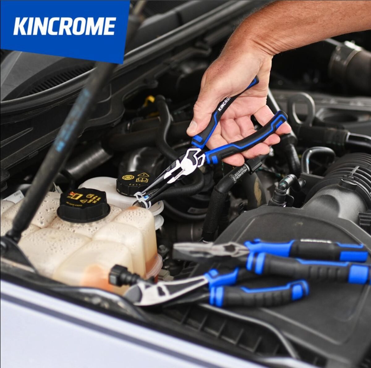 A Person Is Working On A Car Engine With A Pair Of Kincrome Pliers — Summerland Tool Supplies In Casino, NSW