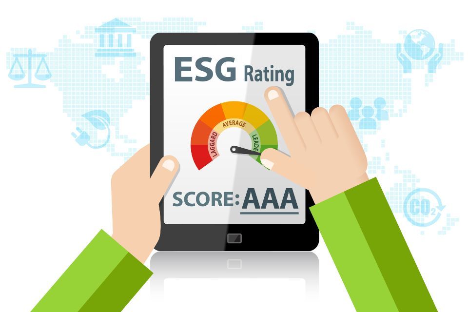 A person is holding a tablet with a score of aaa on it.