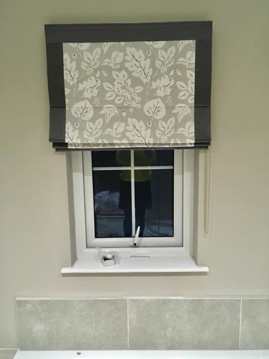 Luxury contrast border trimmed roman blinds