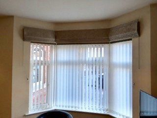 Roman blinds bay window