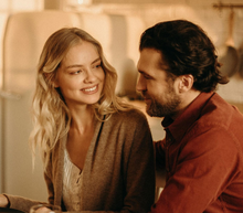 white couple looking at each other
