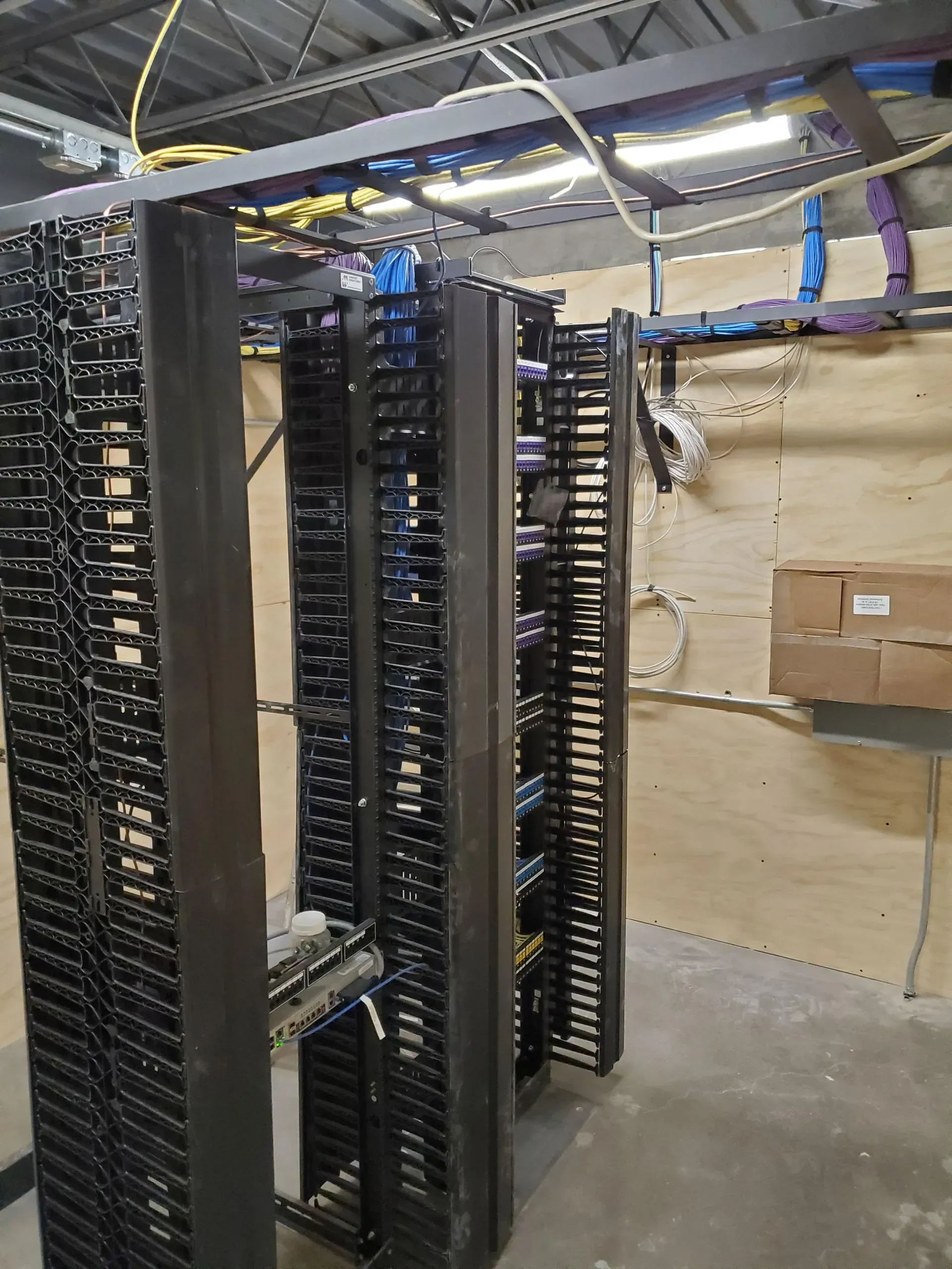 A row of server racks in a server room