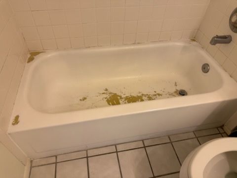 A bathtub before refinishing