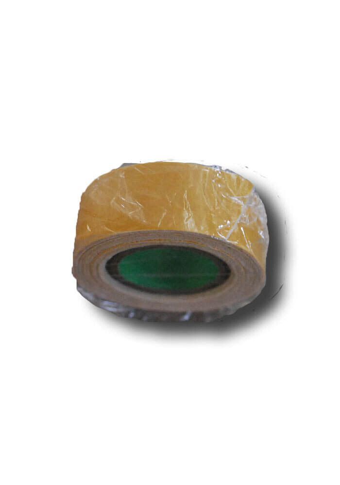 A roll of yellow tape with a green center is wrapped in plastic.