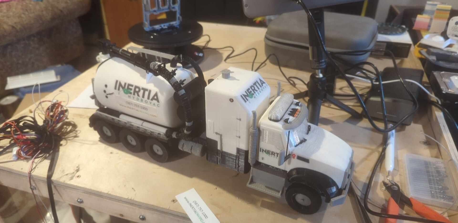 A toy truck with the word invertia on it
