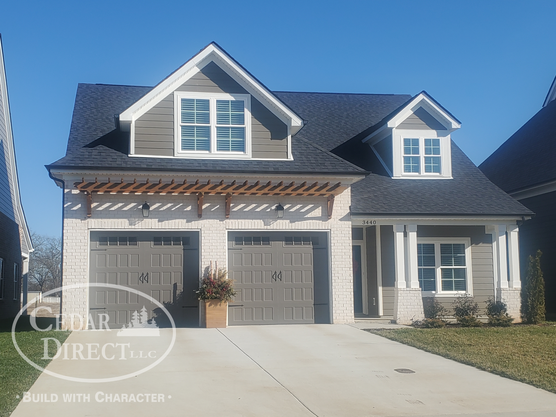 The front of a house that is being built by caesar direct