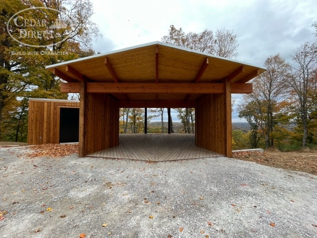 A wooden garage with the word cedar direct on it