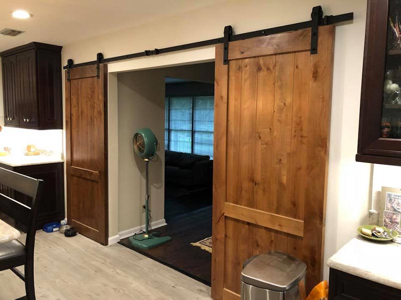 Wood Sliding Doors — Orange Park, FL — BLP Renovations & Kingsley Kitchens