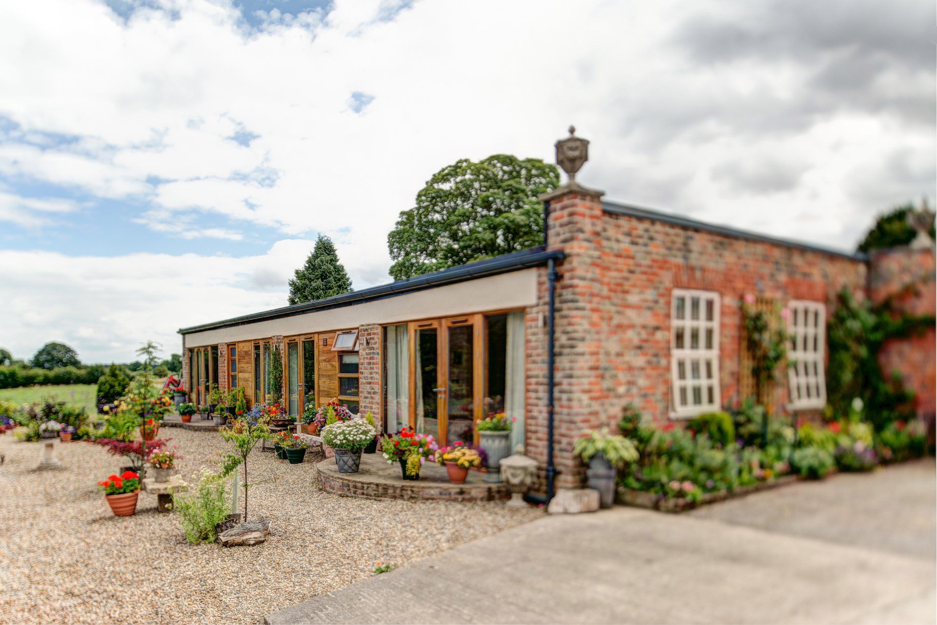 architectural conversion of a grade 2 listed former stables to form a domestic dwelling located within the grounds of a stately home